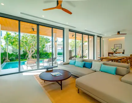 Liva Villa - living room wth pool view