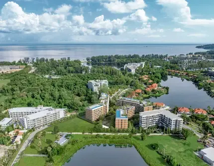 Laguna Aster Phuket luxury condo - aerial view of condo, lakes and sea
