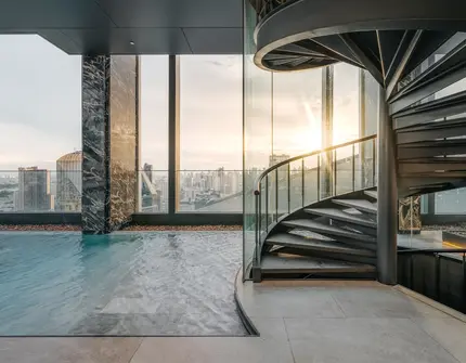 Hyde Heritage Thonglor Bangkok luxury condo - spiral staircase and swimming pool