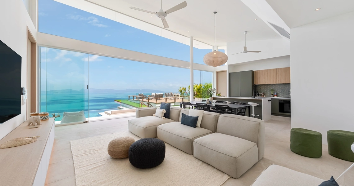 Pacific Palisade Samui luxury villa - living room against sea view backdrop