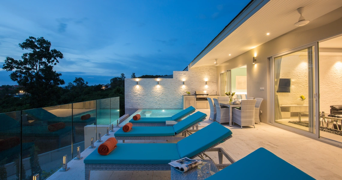 Villa Ambience - sundeck and villa at dusk
