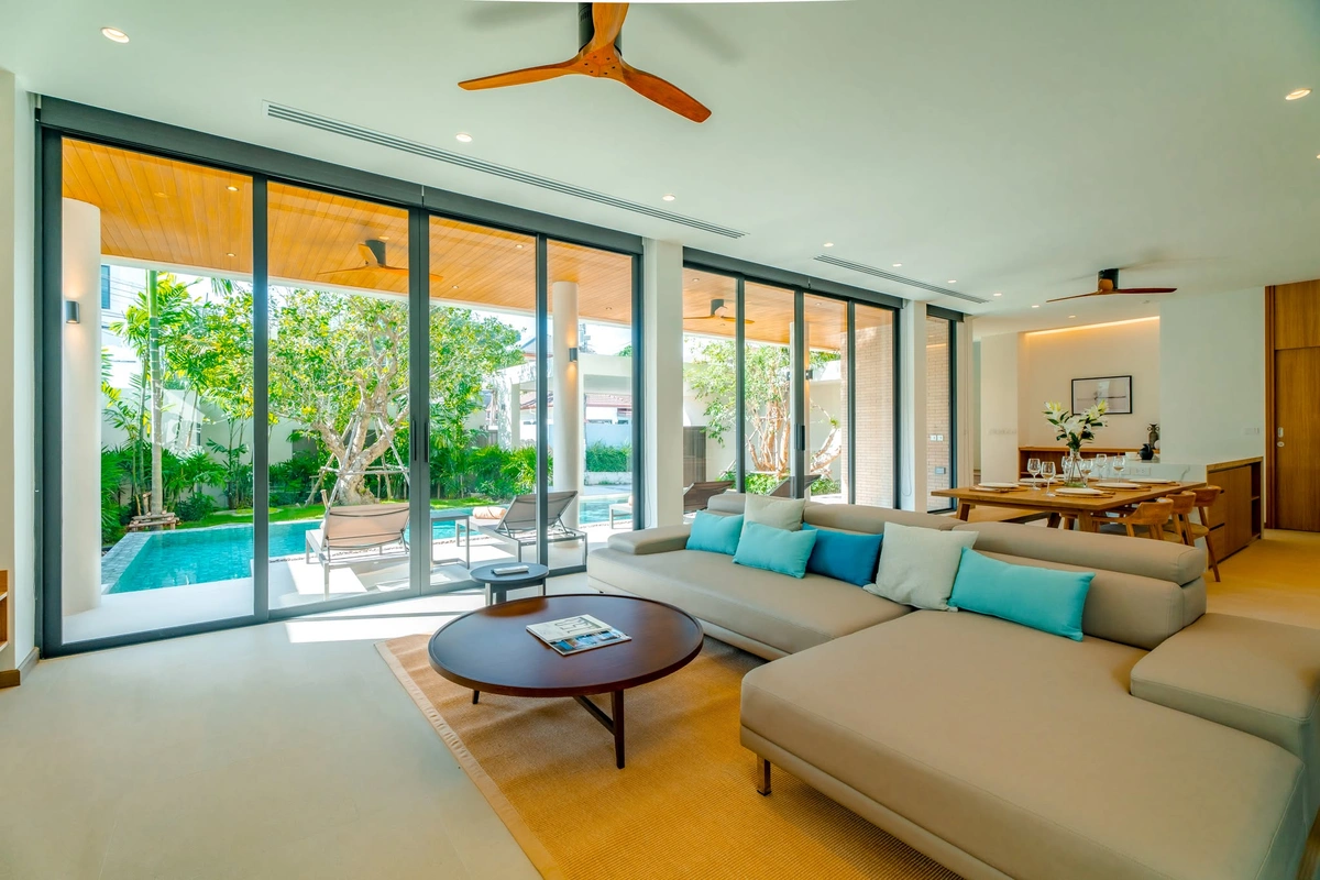 Liva Villa - living room wth pool view