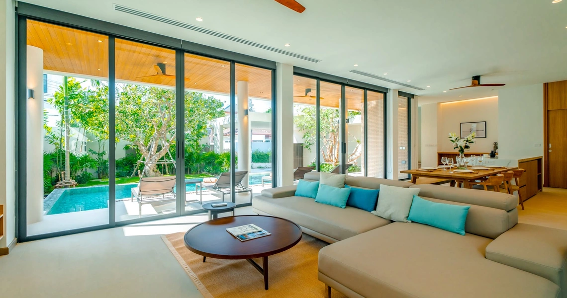 Liva Villa - living room wth pool view